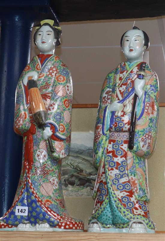 A pair of Japanese large porcelain figures height 59cm